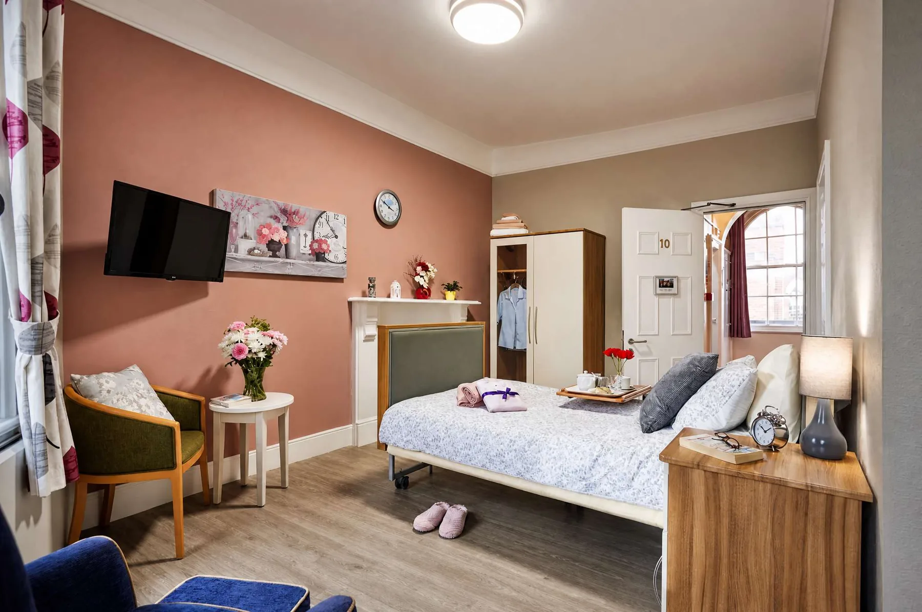 A warm, personalised en-suite bedroom at Belmont Castle
